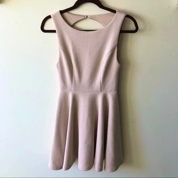 green emerald velvet dress FANCYINN Women's Pink Short Dress Spaghetti Strap Backless Mini Skater  Summer Dress Light Pink L at Amazon Women's Clothing store main image 1